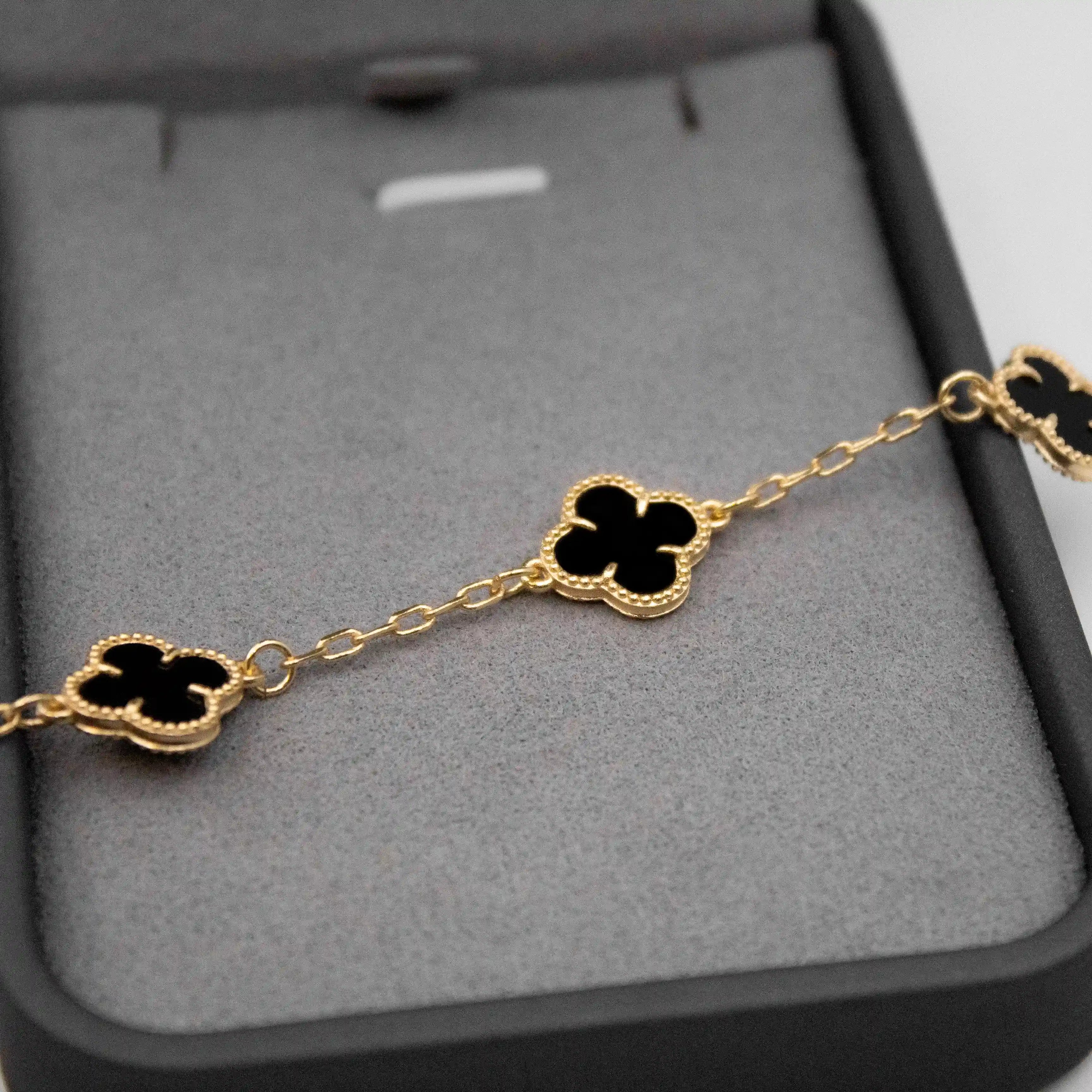 CORRENTE 5 TREVOS BLACK BANHADO A OURO 18K